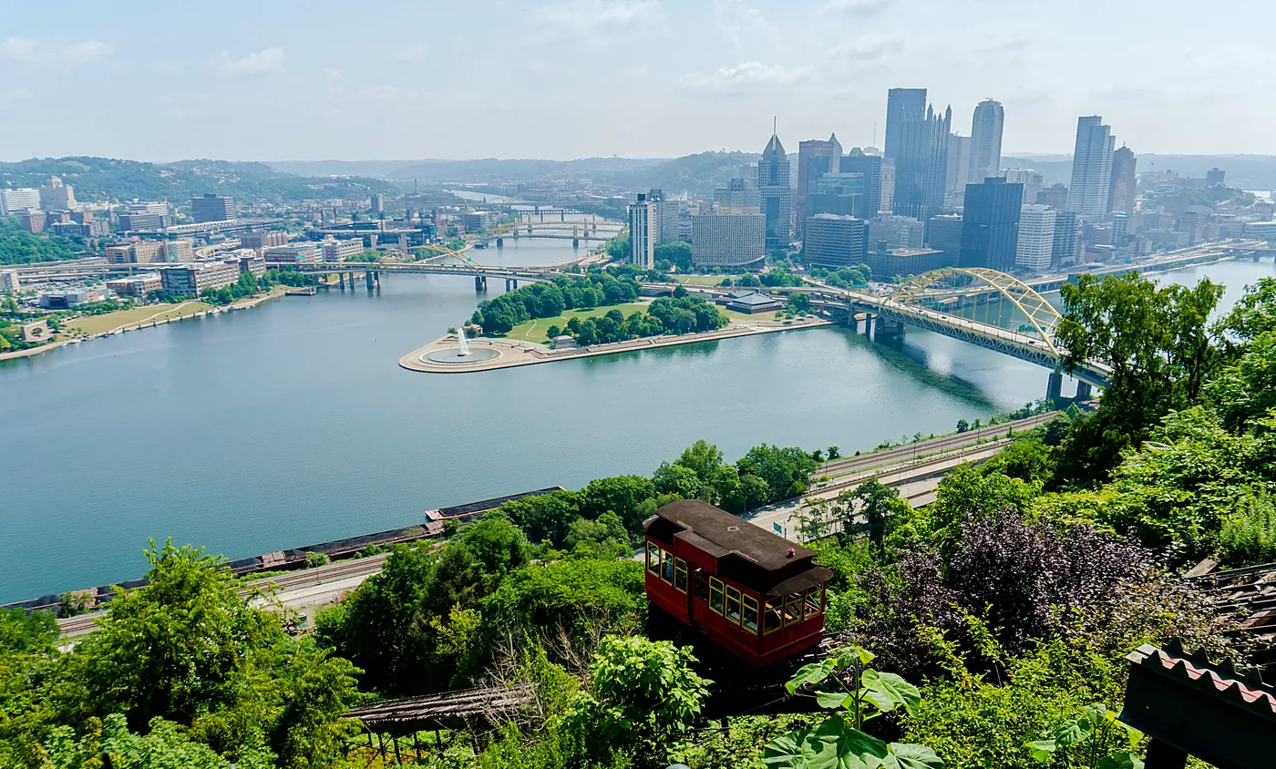 The Pittsburgh skyline, the Point and the red Duquesne Incline car, seen from Mt. Washington on a clear day